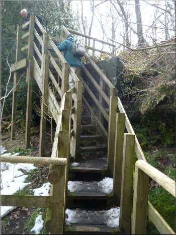 Modern access stair to the old well